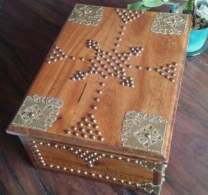 A teak box my Dad made many years ago - sanded to original colour, polyurethaned and decorated with shim brass and solid brass tacks.